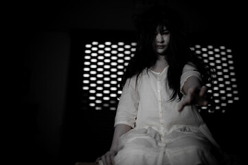 Portrait of asian woman make up ghost,Scary horror scene for background,Halloween festival...
