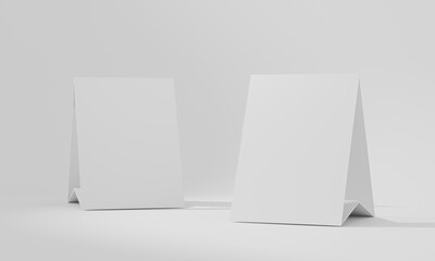 3d render Mock up blank white Table Tent isolated on white background. template for designers design presentation, showcase etc, Paper vertical card, copy space for your logo or graphic design.