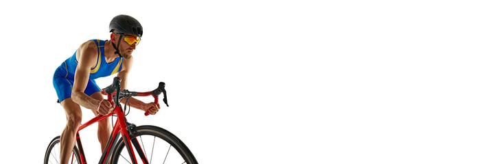 Sport event poster, banner. Man, athlete in uniform, cyclist in motion on bike isolated on white...