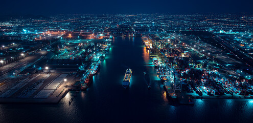 night scene shipping port, container warehouse, cruise ship is sailing out of the port, motion...