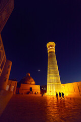 illuminated Kalyan minaret at night in Bukhara