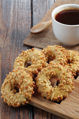 Cookies rings with nuts and coffee