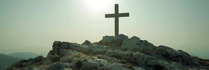 a religious cross on top of a mountain - obrazy, fototapety, plakaty