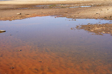 Water ponds developed on the beach during the low water tide season. 