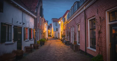 Deurstickers narrow street in the town, Street in the old town of Zaanse Schans, Netherlands © hom