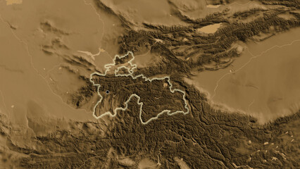 Shape of Tajikistan. Glowed. Sepia elevation. © zelwanka