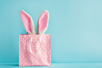 Cute Easter bunny ears in a shopping bag, pastel pink and blue colors with copy space. Generative Ai - 758161375
