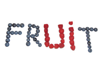 The word fruit made from pieces of raspberry and blueberry