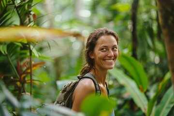 A woman with a bright grin, exploring a lush tropical jungle, her curiosity piqued by the vibrant flora and fauna that surround her, each step filled with wonder and excitement - obrazy, fototapety, plakaty