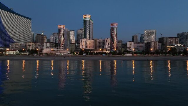 Flying over modern luxury hotel Colosseum Marina on Sherif Khimshiashvili street. Batumi, Georgia 2024 spring