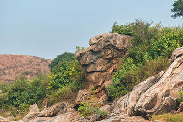 rustic nature landscape with primitive, rock formations in river bed of Telwa and nearby Dharara waterfalls in Simultala, Bihar. This landscape is part of Chota Nagpur Plateau.
