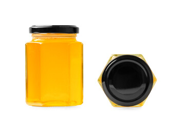 Honey in jars on a white background close-up.