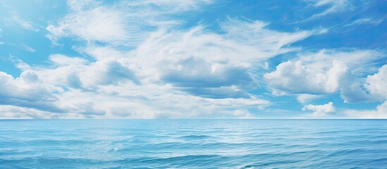 Obraz premium Serenity Blue - Majestic Ocean Horizon with Fluffy Clouds and Endless Waterscape