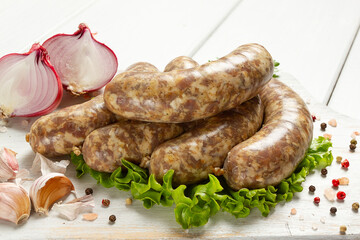 raw kupaty, traditional Georgian sausages, raw sausages, with spices and herbs, Georgian cuisine,