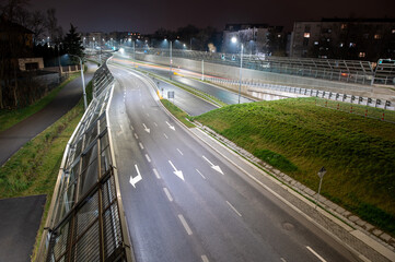 Highway at night in the city. View from above. Long exposure.
