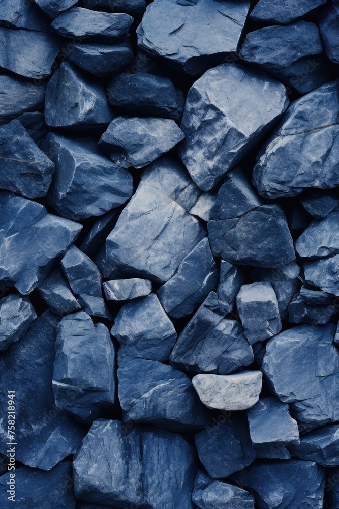 Poster a pile of blue rocks sitting next to each other. suitable for various design projects