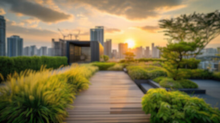 This blurred image captures the essence of a sunset over a city skyline, viewed from a lush rooftop...