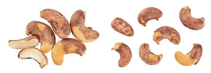 Foto op Aluminium cashew nuts heap with shell isolated on white background. Top view. Flat lay © kolesnikovserg