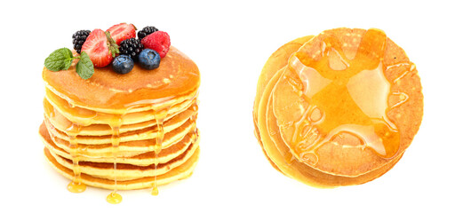 Pancakes stack with different berries and honey isolated on white background