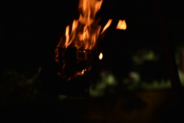 Flames of a coppara torch that lighting in Kandy Esala Perahera at Temple of the Tooth (Sri Dalada Maligawa), Kandy, Sri Lanka. - obrazy, fototapety, plakaty