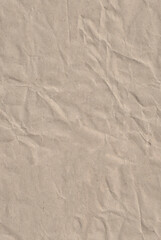 Seamless battered craft paper texture. Brown spotted abstract material. Vertical portrait orientation.