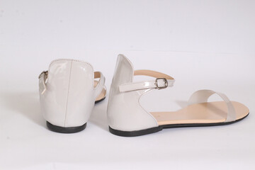 This the picture of woman`s Flat Sandle
Elegant women's sandal shoes featuring a classic design...