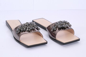 Picture of women flat chappal. Ladies' Flat Slippers are so easy to style and versatile that a...