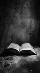 The old book on a dark background. Black and white photo.
