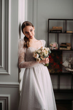 The image shows a person in a wedding dress indoors 6483.
