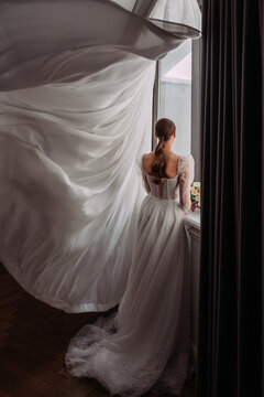 The image features a person wearing a wedding dress 6498.