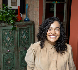 Portrait of a brazilian woman indoors at home