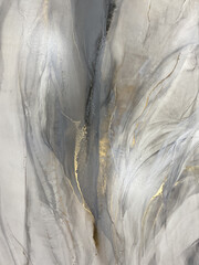 Abstract grey marble with gold — fluid art background with golden potal, stone texture made with alcohol ink. Big black and white natural marble backdrop resembles gold watercolor or aquarelle.