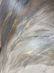 Abstract grey marble with gold — fluid art background with golden potal, stone texture made with...