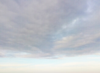 hanging gray clouds on blue sky texture background wallpaper