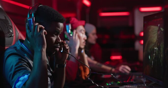 Gamers playing in a competitive gaming tournament