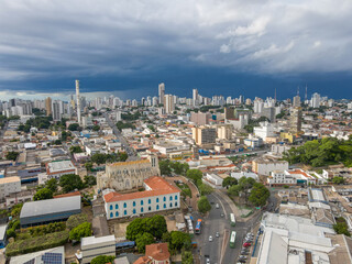 Naklejka premium Aerial city scape in summer with storm clouds in Cuiaba Mato Grosso