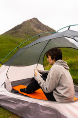 Heather Dreams: Woman by the Valley, Lost in Her Ebook, Wrapped in the Mystique of Scotland