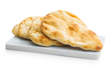 Freshly Baked Naan Bread on cutting board isolated on white background.