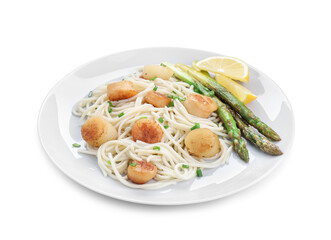 Delicious scallop pasta with asparagus, green onion and lemon isolated on white