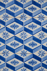 Colorful typical tiles on a wall in Portugal with traditional patterns