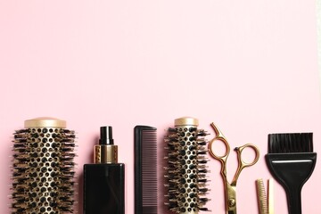 Professional hair dresser tools on pink background, flat lay. Space for text - obrazy, fototapety, plakaty