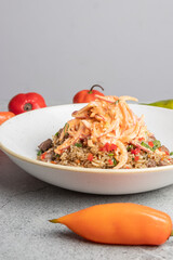 Arroz Chaufa en fondo de piedra con decoraci&oacute;n de Ajies  Pimientos, 