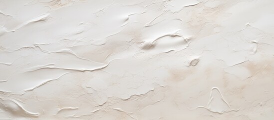 Obraz premium A close up of a white wall with a liquidlike texture resembling fluid concrete or beige wood flooring, creating a unique landscape in the science of soil