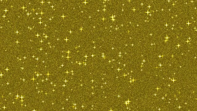 Gold glitter background with sparkling texture. Stars sequins sparks and glittering glow foil background. Abstract of Golden glittering background.