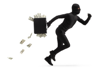 Full length profile shot of a thief running with money in a briefcase