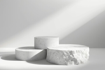 Three concrete pedestals on a clean white surface, suitable for product display