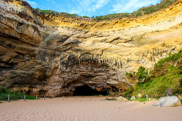 Limestone cave on the rock face of the Loch Ard Gorge in the Twelve Apostles Marine National Park along the Great Ocean Road in Victoria, Australia