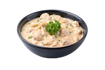 Creamy chicken in a black bowl isolated on transparent background.
