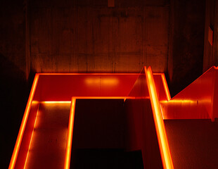 Stairs of an industrial building with red lights