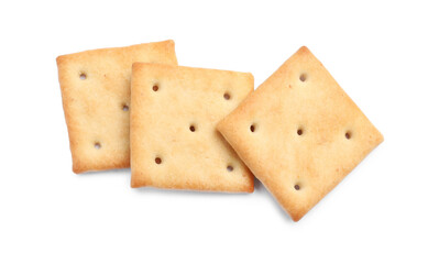 Tasty crispy square crackers isolated on white, top view